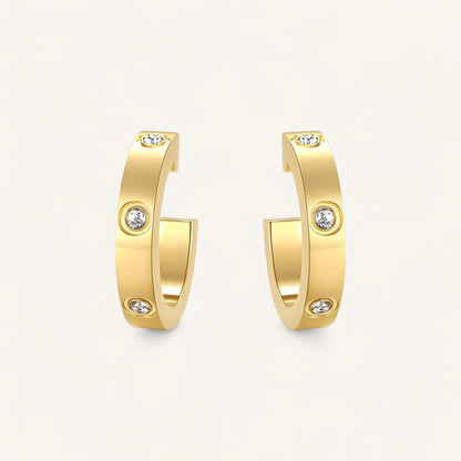 ChatGPT said:

Black Leopard Jewellery MIA Hoop Earrings | MIA Gold Hoops | Minimalist MIA Earrings | Elegant MIA Jewellery | Black Leopard MIA Earrings